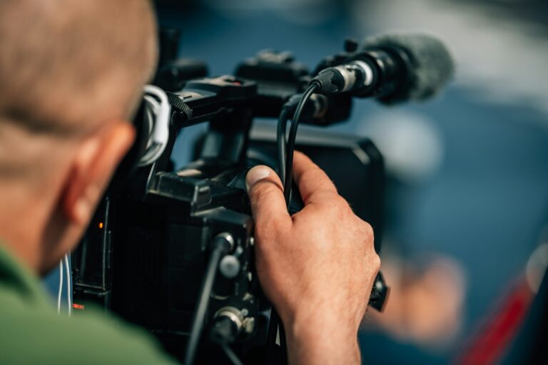 Live streaming. Camera at a Press Conference.